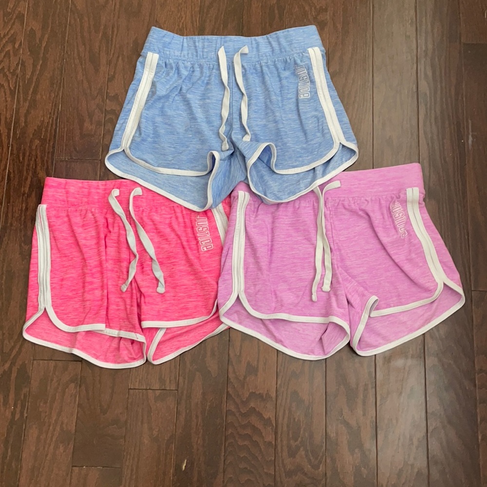 A bundle of girls shorts ( pink, purple, and blue)